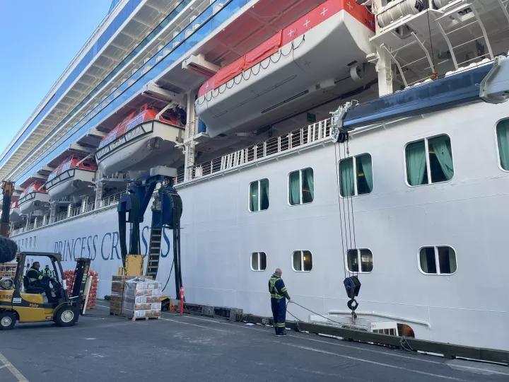 Cruise ship being loaded with supplies